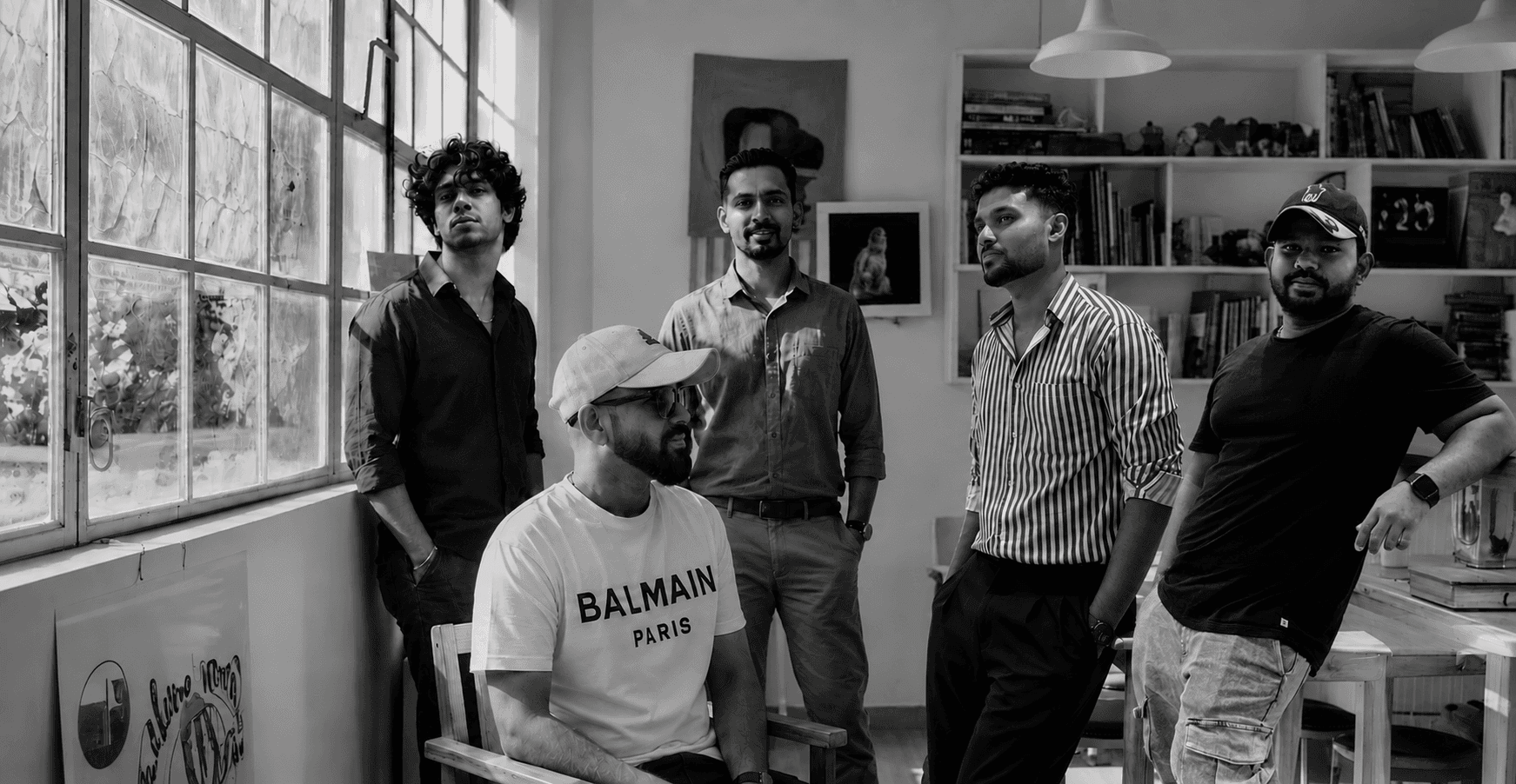 The Adpedia team together in the studio, in black and white