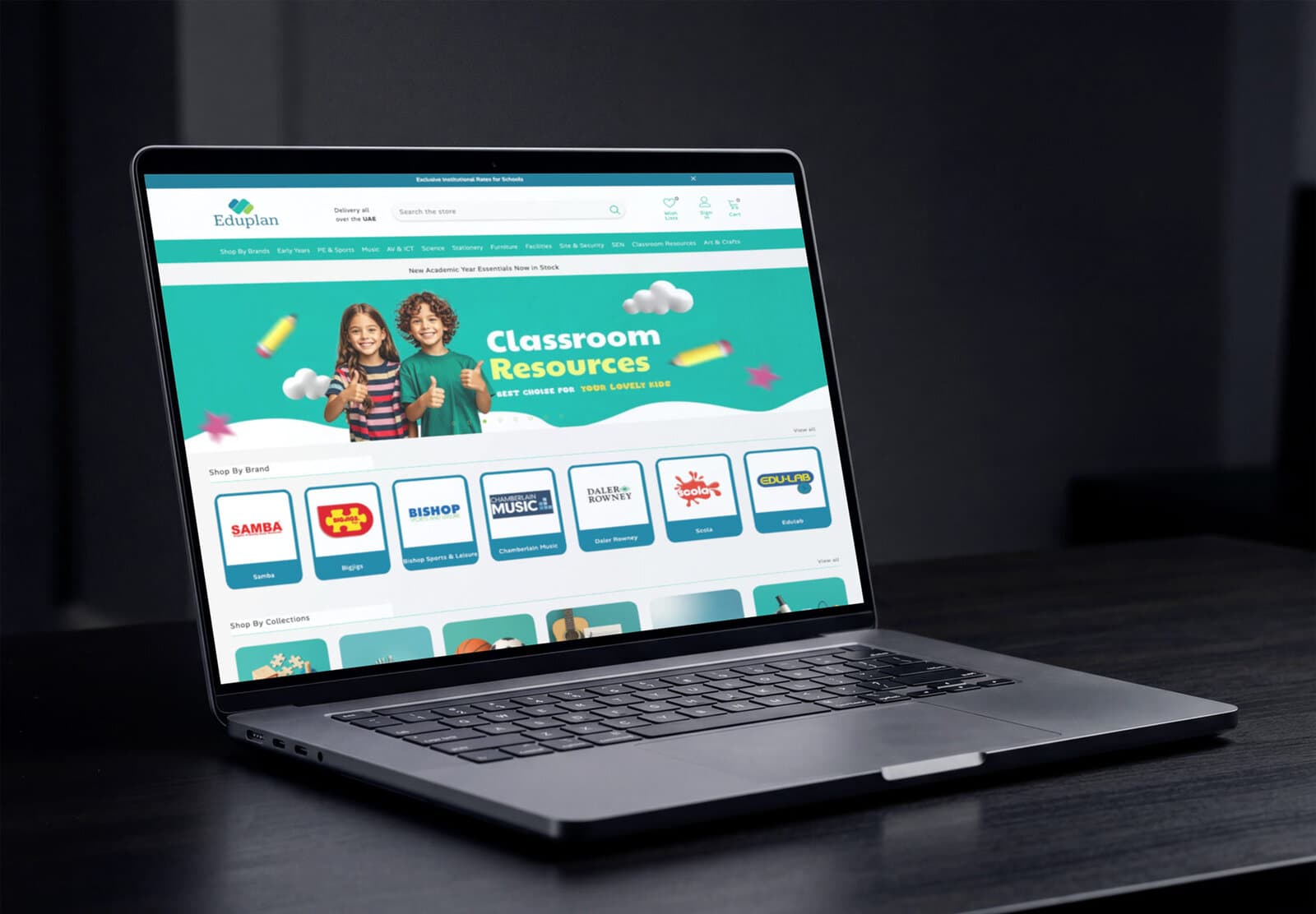 The Eduplan homepage on a laptop, showing the Classroom Resources banner and a Shop By Brand row